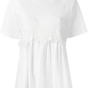 Chloe T-shirt appliqued with crocheted flowers.